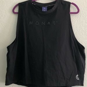 Monat black top size xl says Monat and has logo on the bottom